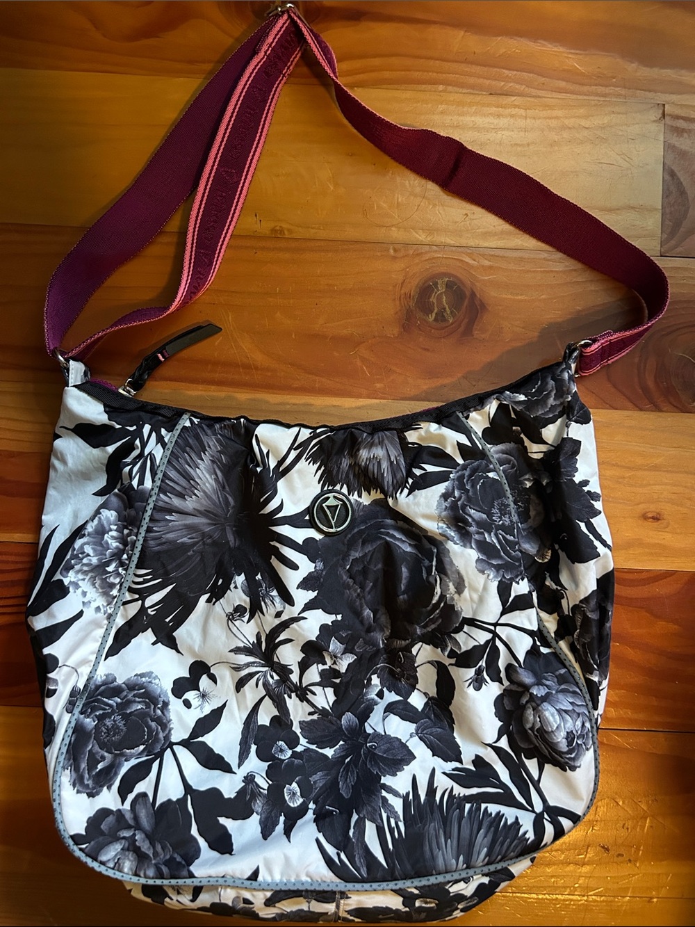 Ivivva Black & White Floral Crossbody with Wine Strap